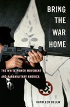The cover of a book featuring a person aiming a modern rifle, standing in front of a member of the KKK in Klan garb.
