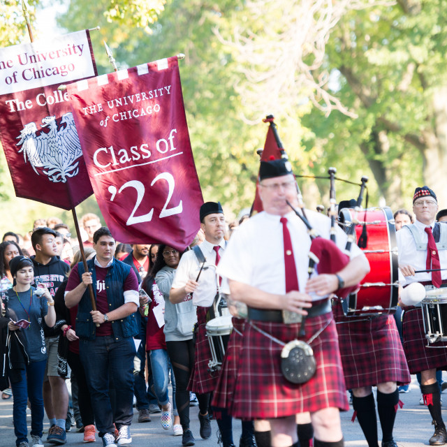 Bagpipers and drummers lead a procession for opening convocation, class of 2022.