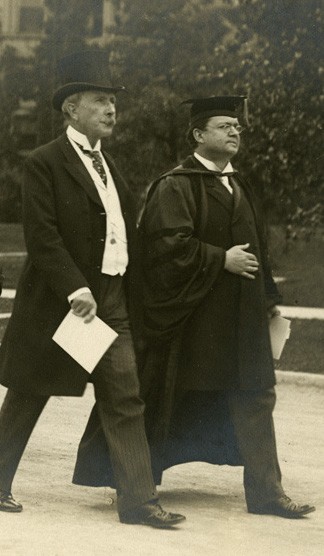 John D. Rockefeller and William Rainey Harper.