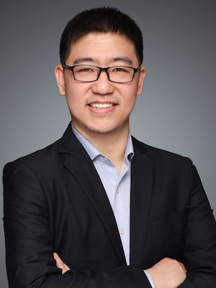 Portrait of Yucheng Peng in suit.