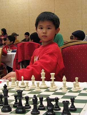7-year-old Awonder Liang competing in a chess competition