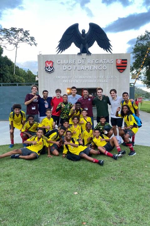 UChicago men's soccer team socializes with Brazilian soccer players.