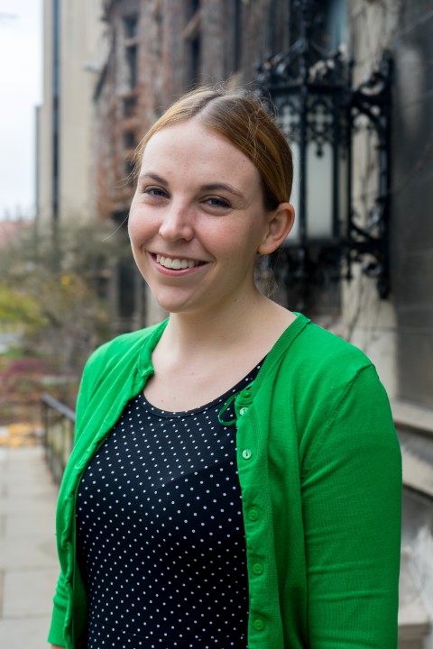 Close view of Meghan Elliott standing outdoors.