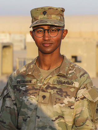 A portrait of Natnael M. Getahun wearing an army uniform.