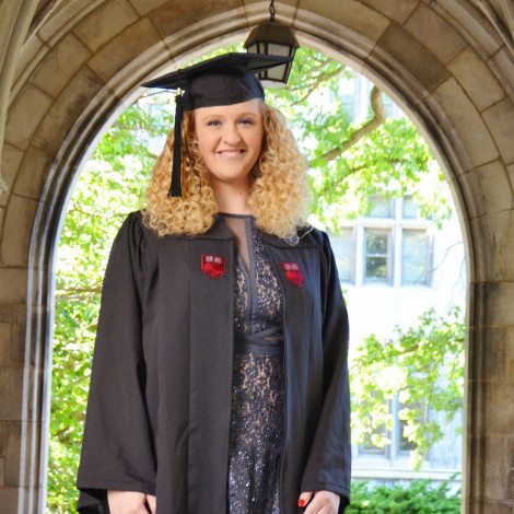 Portrait of Heather Weller in cap and gown.